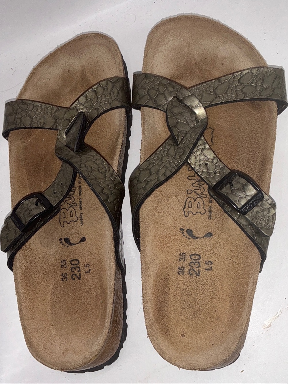 Birckenstock’s Metallic Olive Green Crisscross Slide Sandals